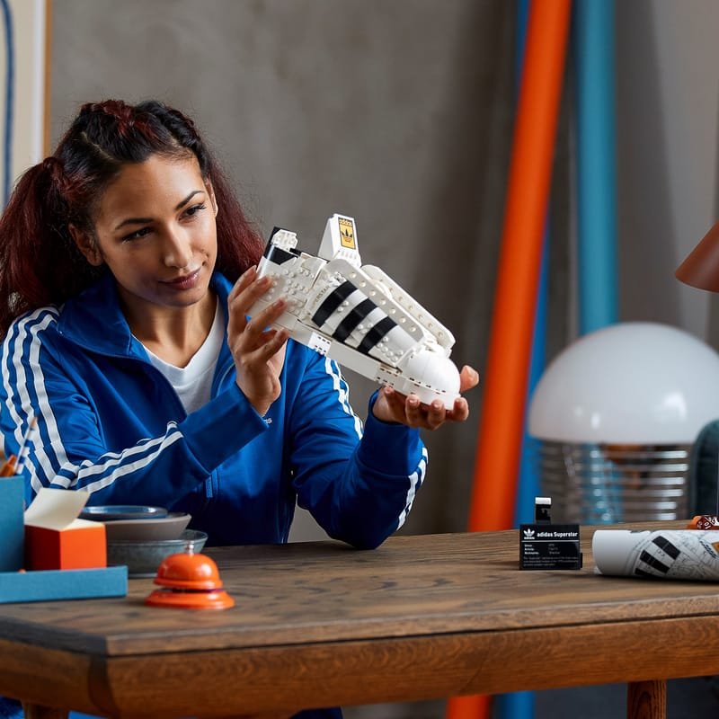 brick sneaker model side profile three stripes